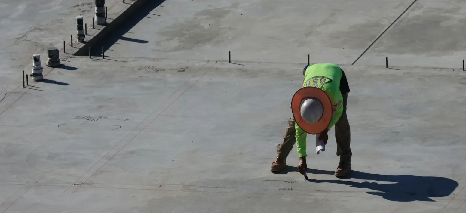Concrete slab installation in Renton WA - contractor finishing garage floor slab